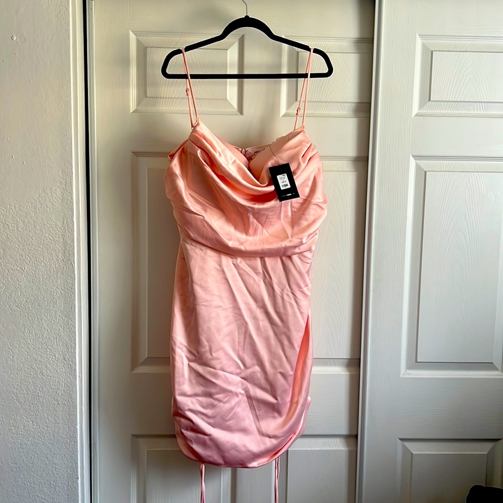 Never wore before, has a bra attached to the dress.